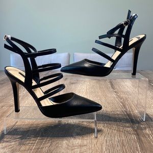 Guess 4” high heels black pumps with straps. Brand new, unused size 6.5.